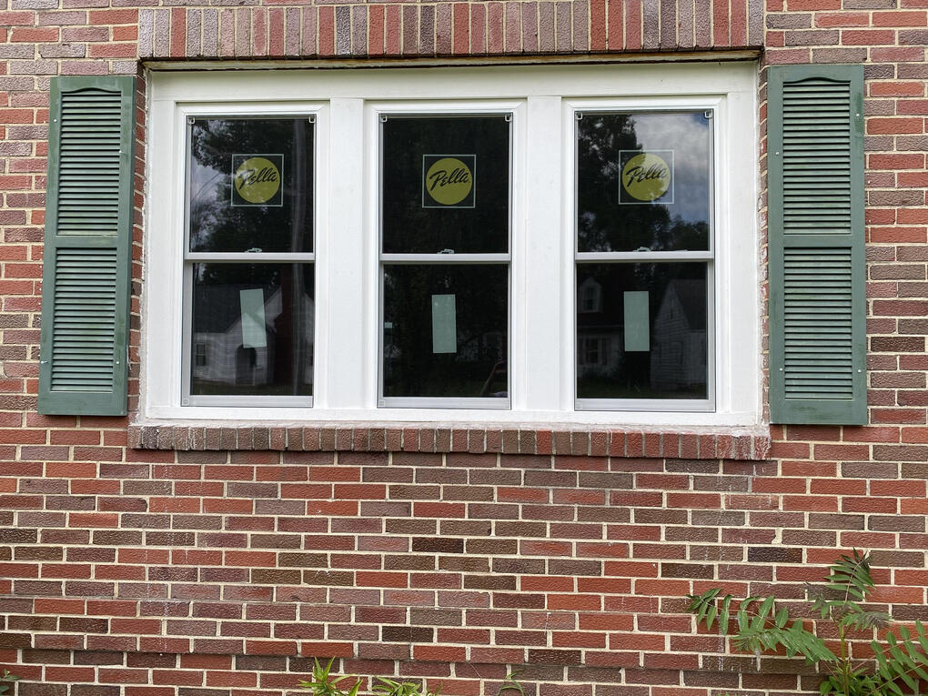 After - picture window, West End After: three new double-hung windows with framed mullions replacing a cracked picture window, Decatur, IL
