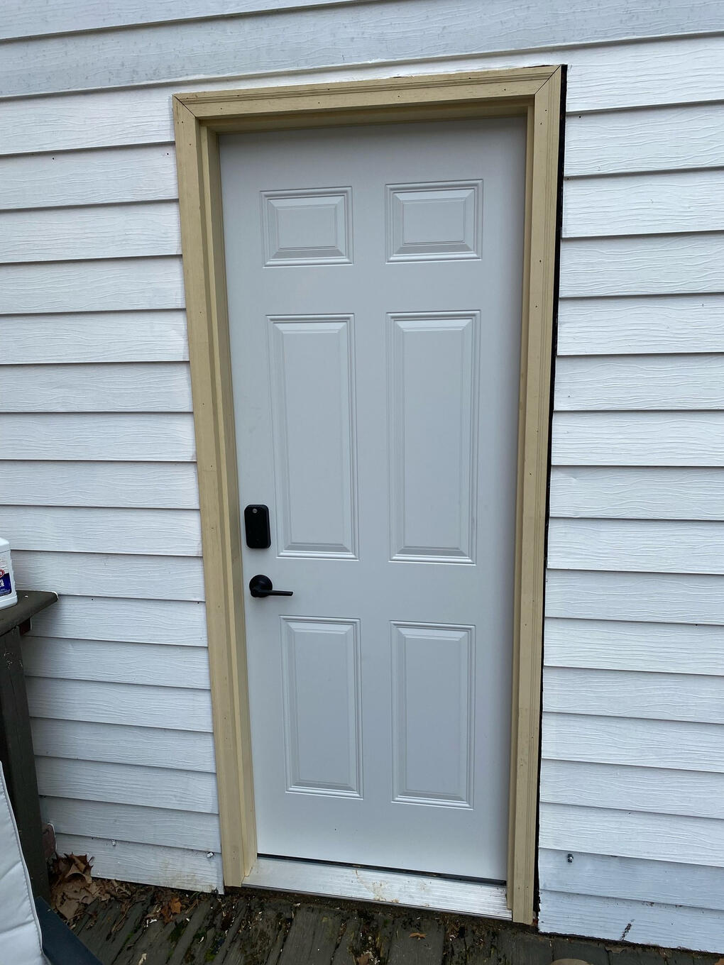 After - back door, West End After: new 6-panel metal back door with smart lock, West End, Decatur IL